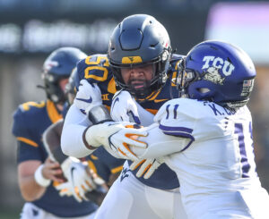 Brandon Yates working on connections with WVU quarterbacks